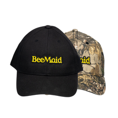 Black and camouflage baseball caps with 'BeeMaid' logo on a white background