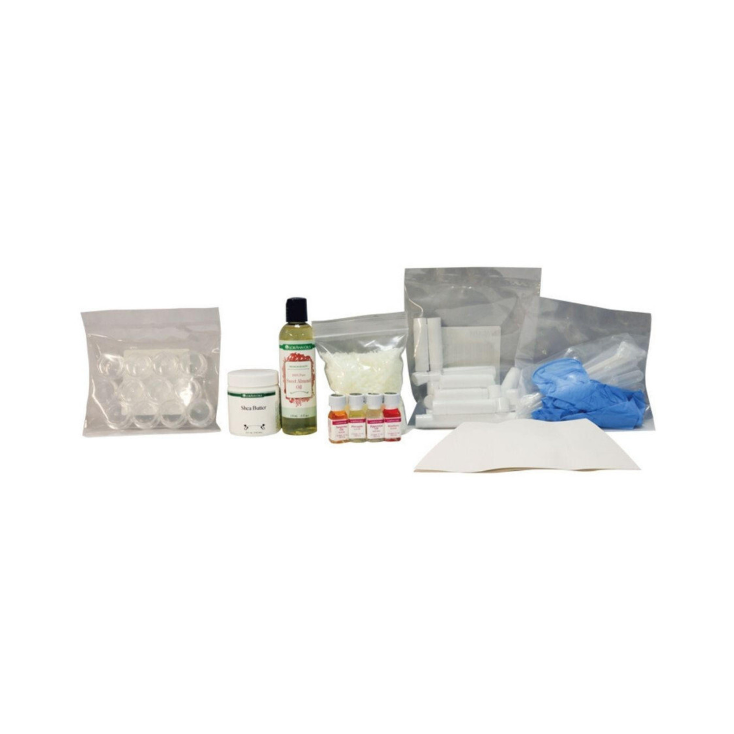 A collection of lip balm making supplies on a white background