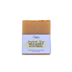 A single bar of handmade soap labeled 'Handmade Soap Milk Honey & Oatmeal' on a plain white background.