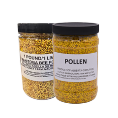 Two jars of pollen with black lids on a white background