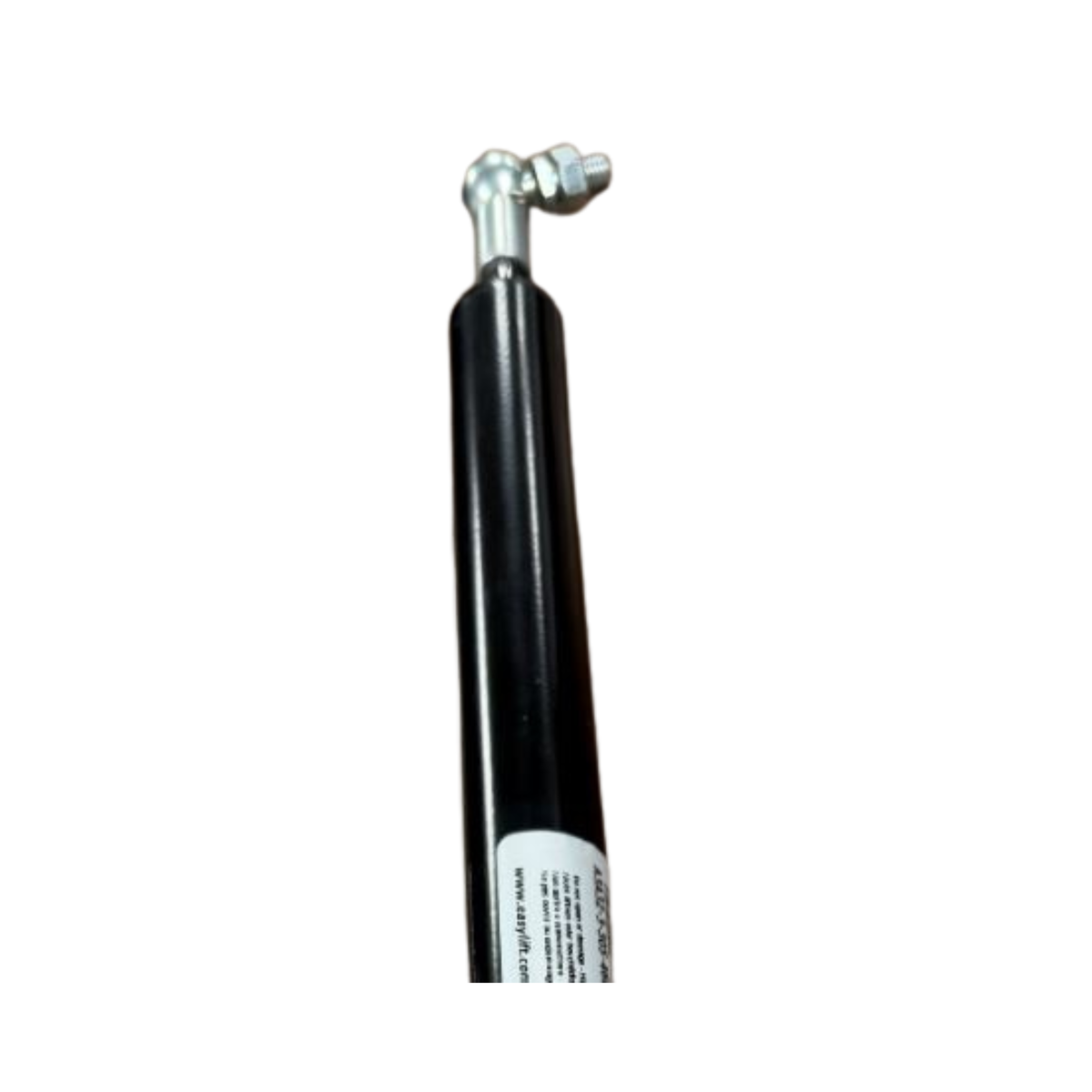 Black cylindrical shock absorber with a label on a white surface