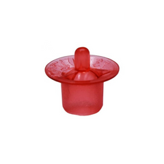 A red plastic queen cell cup used in queen rearing on a white background. 