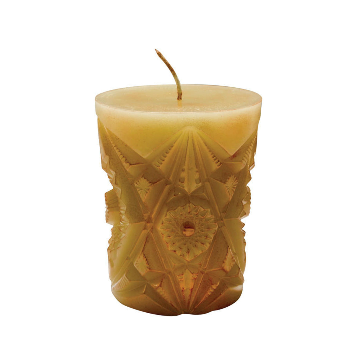 Decorative beeswax candle with an intricate kaleidoscope design on a white background