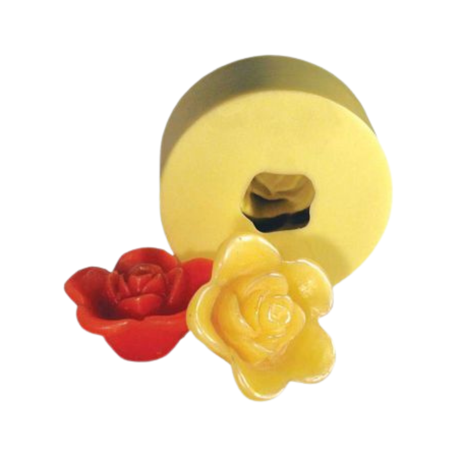 A yellow candle mold next to two produced rose-shaped candles on a white background