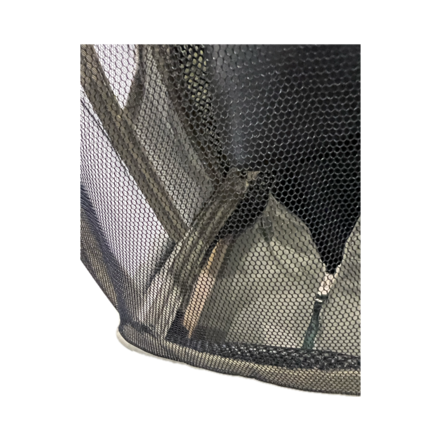 Close-up of the mesh on a khaki-coloured hood from a beekeeping suit on a white background