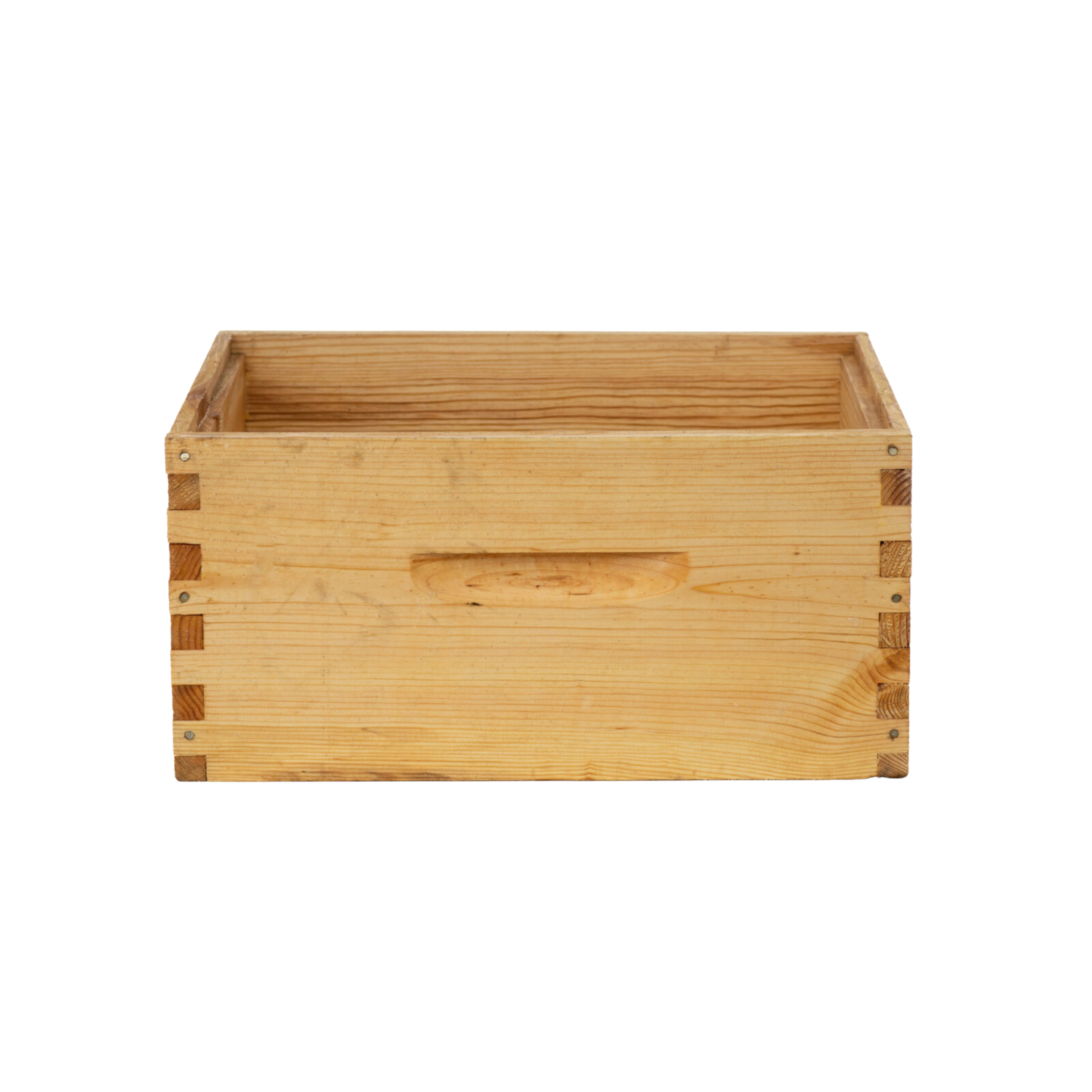 A wooden bee super box used in beekeeping. It is rectangular, open at the top, and made of light-colored wood with visible knots and finger-jointed corners on a white background