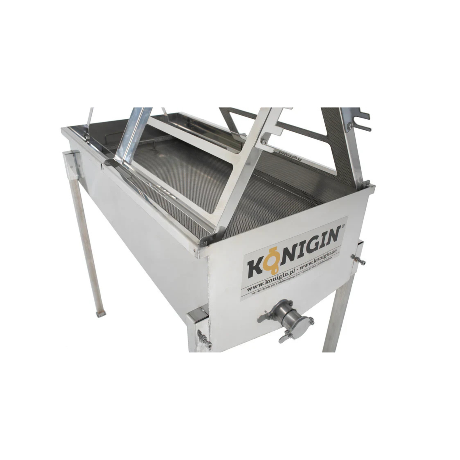 Metallic machine with 'Königin' branding on a white background