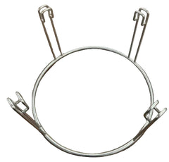 A circular metal holder or stand made from silver wire. The ring has four vertical wire supports spaced evenly around the circle, each with a bent hook-like end. The stand is placed on a wooden surface.