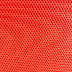 A close up of an adobe orange beeswax craft sheet 