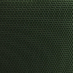 A close up of a dark green beeswax craft sheet 