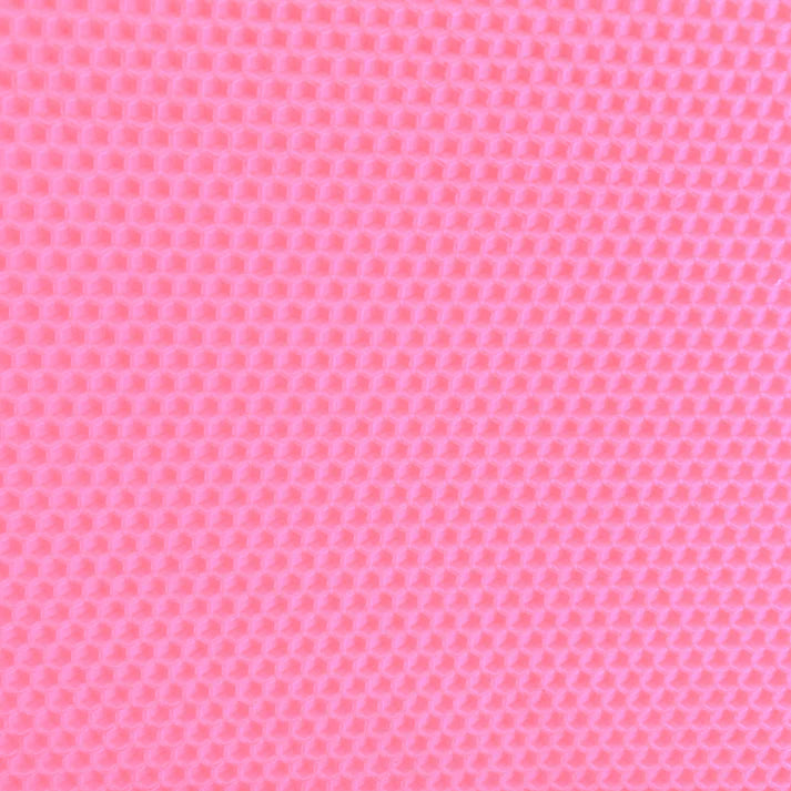 A close up of a pink beeswax craft sheet 