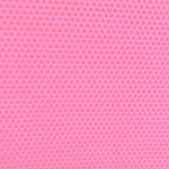A close up of a pink beeswax craft sheet 
