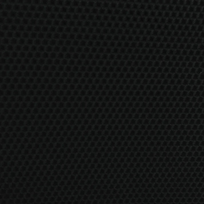 A close up of a black beeswax craft sheet 