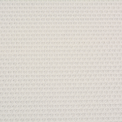 A close up of a white beeswax craft sheet 